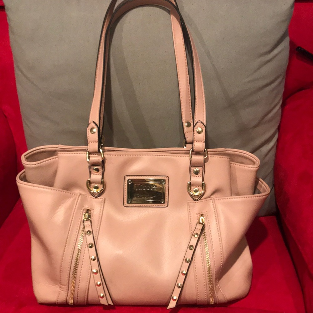 Rose gold purse by Nicole Miller